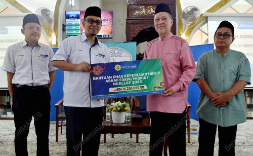 SIMBOLIK PENYERAHAN BANTUAN KHAS KEPERLUAN HIDUP