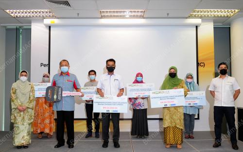 MAJLIS PENYAMPAIAN AGIHAN ZAKAT WORLDWIDE HOLDING BERHAD
