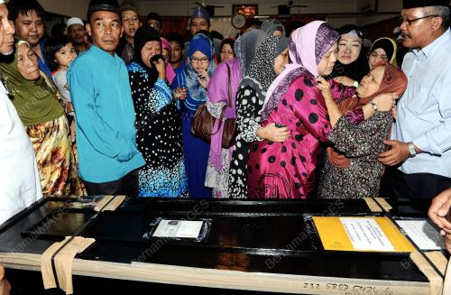 SG11_06062013_JENAZAH_PULANG