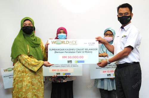 MAJLIS PENYAMPAIAN AGIHAN ZAKAT WORLDWIDE HOLDING BERHAD