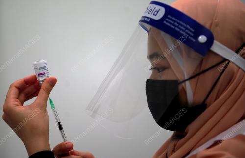 TINJAUAN HARI PERTAMA PEMBERIAN VAKSIN ASTRAZENECA DI IDCC