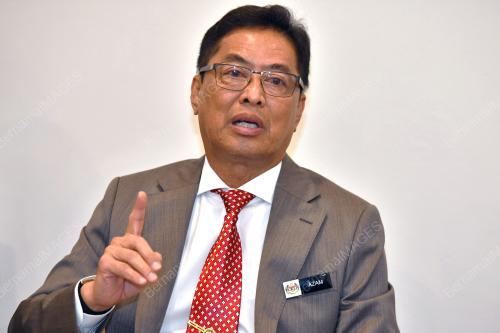 TAN SRI AZAM BAKI