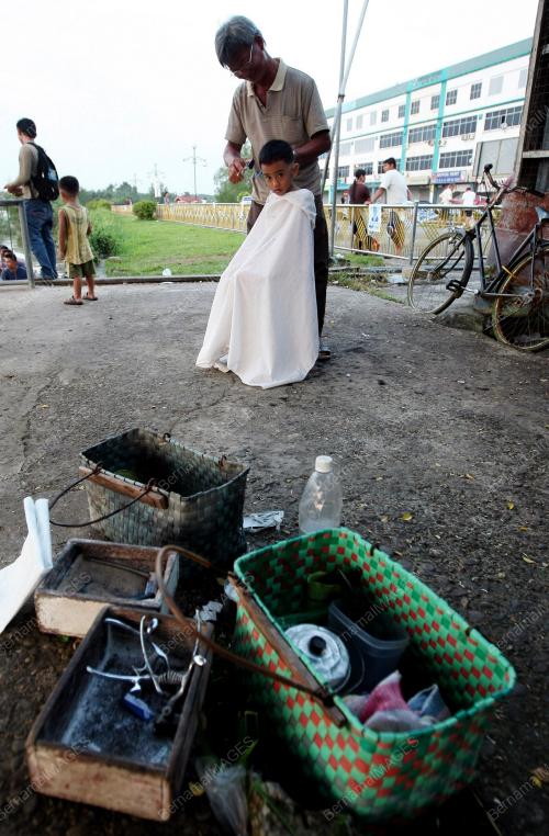 TUKANG GUNTING