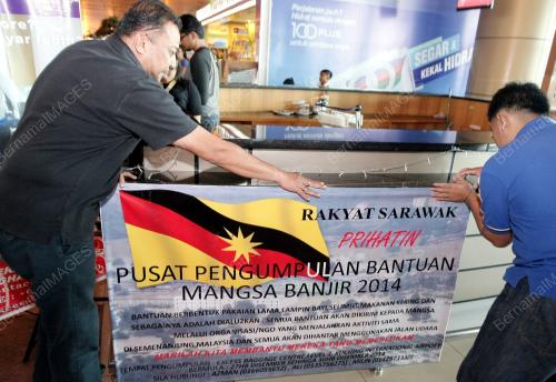 SK03_27122014_BANTUAN_BANJIR