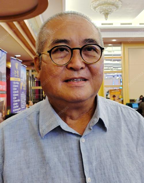 ADAM YII