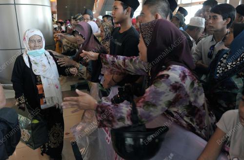 SK11_14112012_HAJI_PULANG