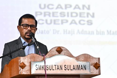 DATUK DR ADNAN MAT