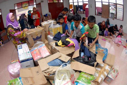 TR03_28122014_BANTUAN_K1M