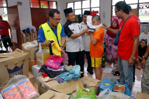 TR04_28122014_BANTUAN_K1M