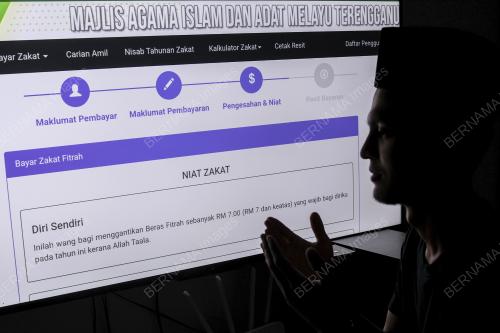 PEMBAYARAN ZAKAT FITRAH SECARA DALAM TALIAN
