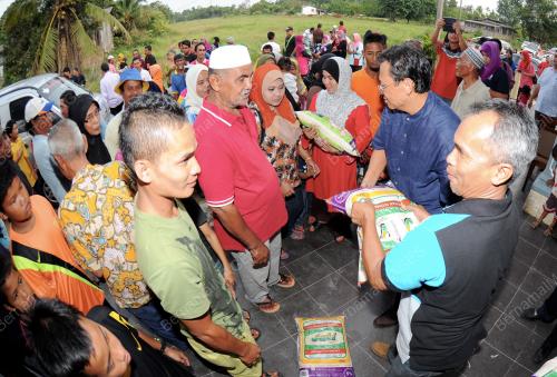 TR05_24122013_SUMBANGAN_BERAS