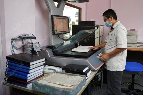 PENDIGITILAN BUKU