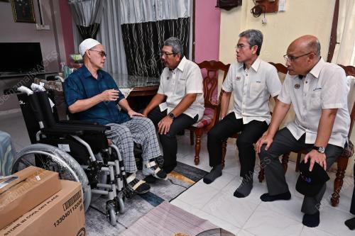 TAN SRI WAN AHMAD DAHLAN ABDUL AZIZ