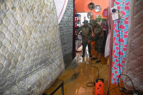 PEMBERSIHAN RUMAH MANGSA BANJIR