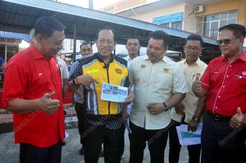 AHMAD MASLAN