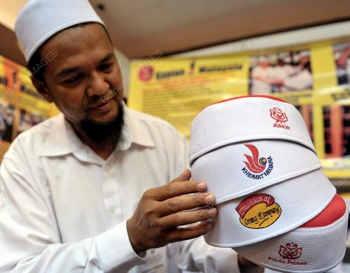 UMNO58_06122013_KOPIAH