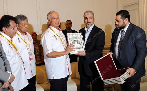 UMNO64_03122013_NAJIB